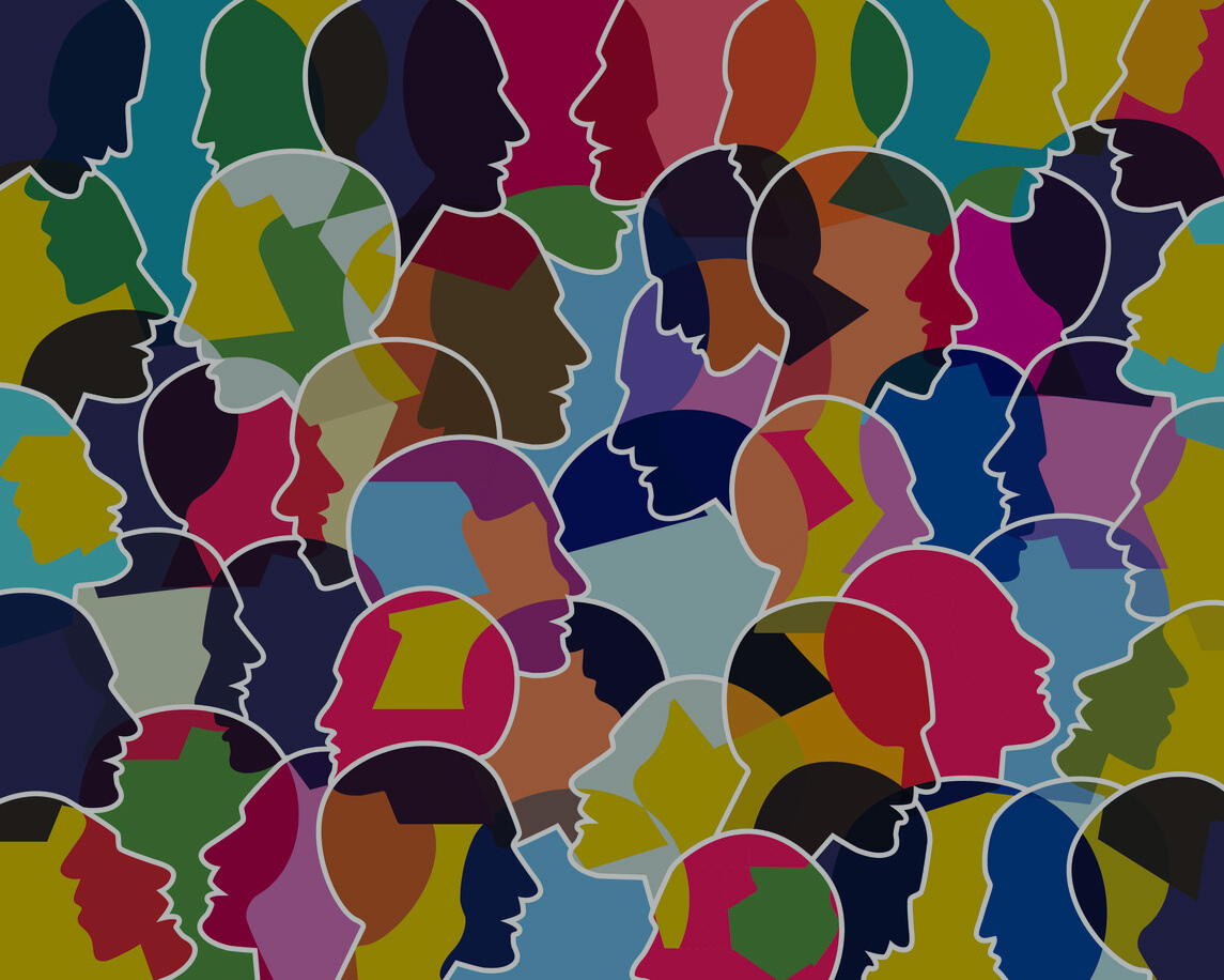 An illustration of silhouetted faces in a variety of colors facing each other